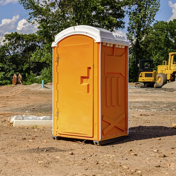 what is the cost difference between standard and deluxe portable restroom rentals in Almer